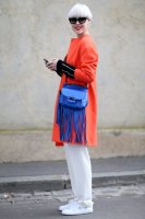 2.-orange-coat-with-white-pants-and-cobalt-blue-bag.jpg